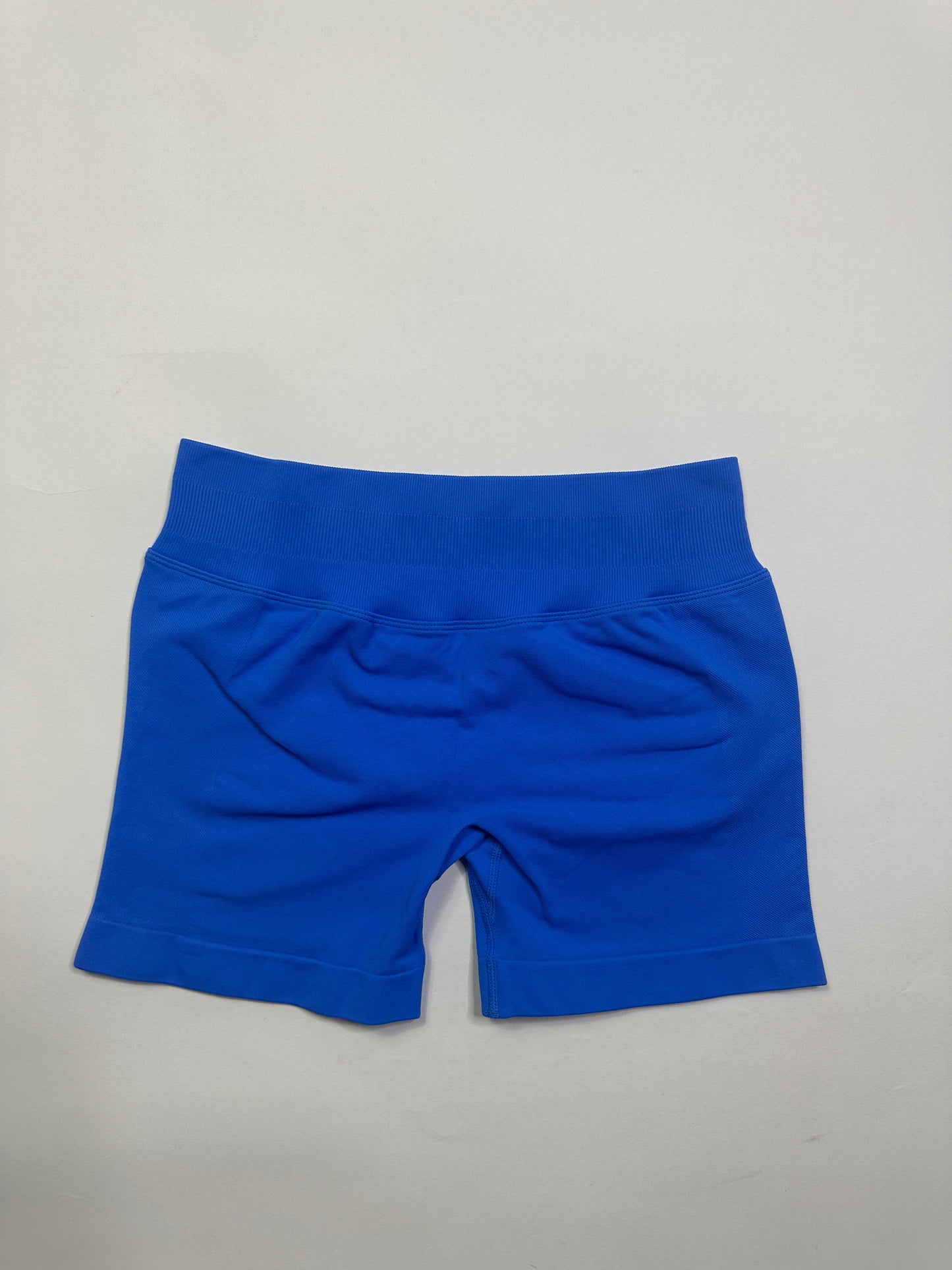 Blue top on a light gray background
